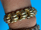 puffy croissant link 18k gold hidden clasp bracelet