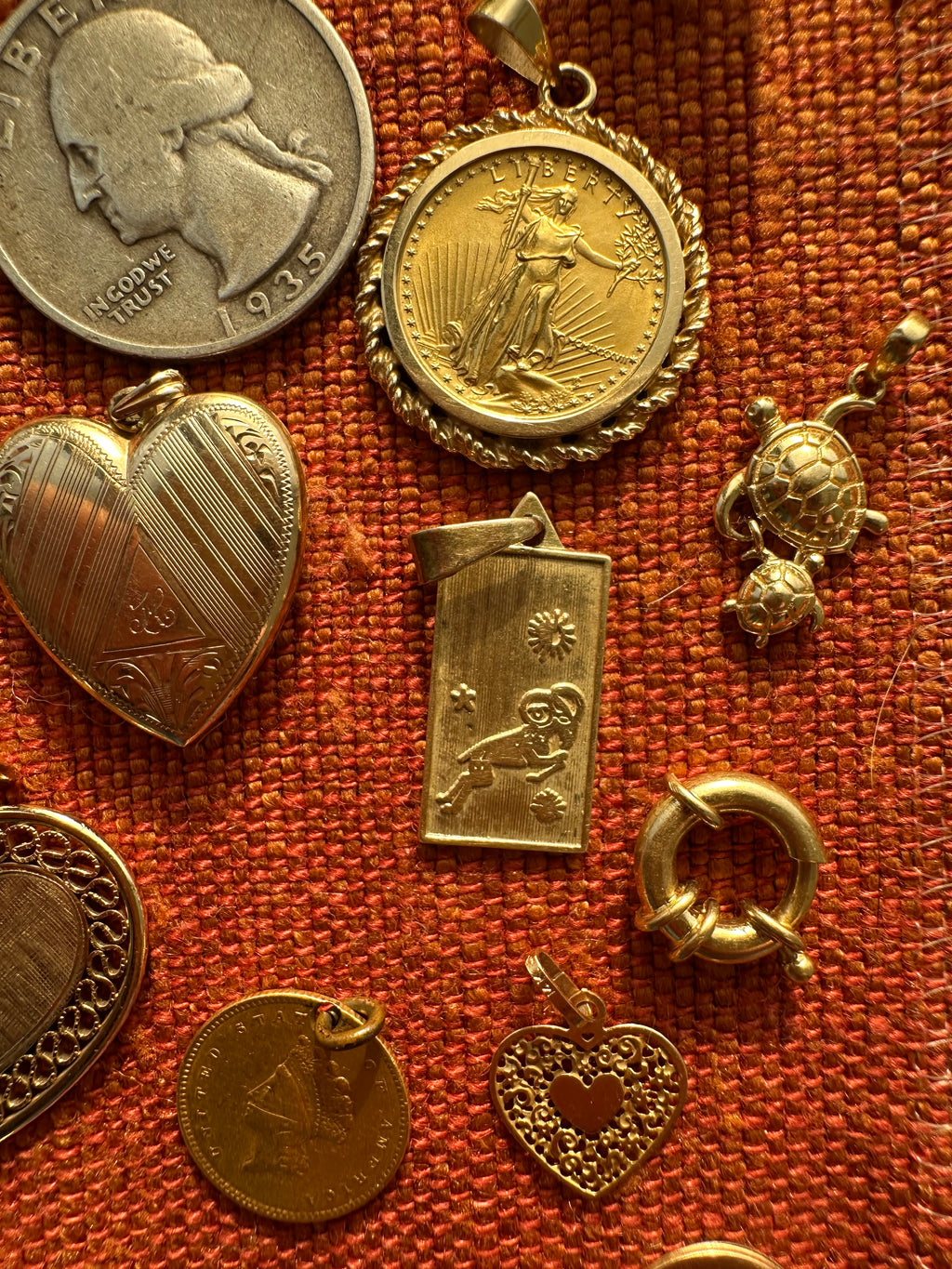 plethora of vintage gold charms