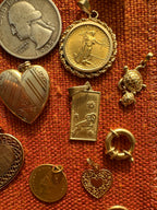 plethora of vintage gold charms