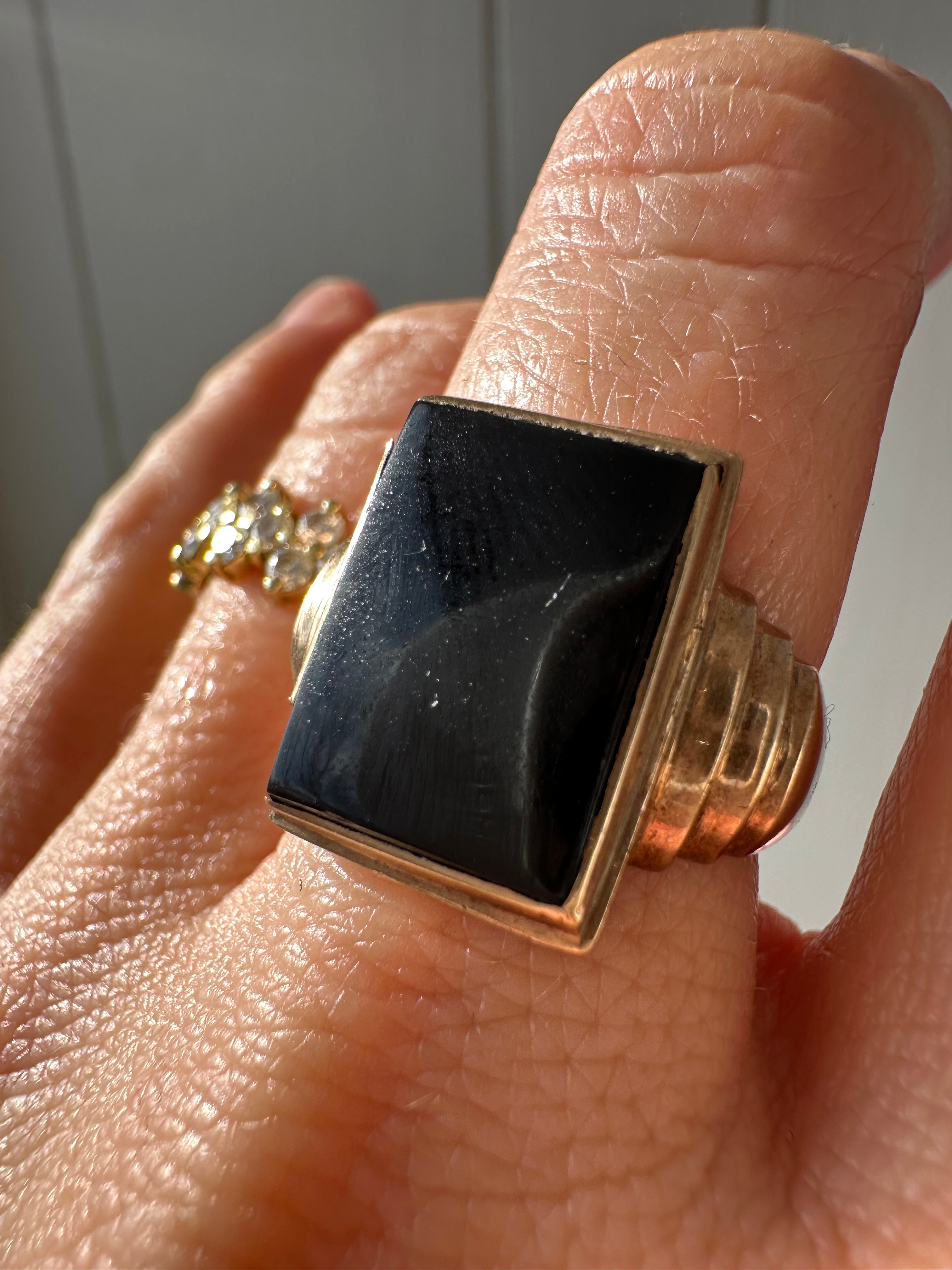 rosy gold and onyx vintage ring