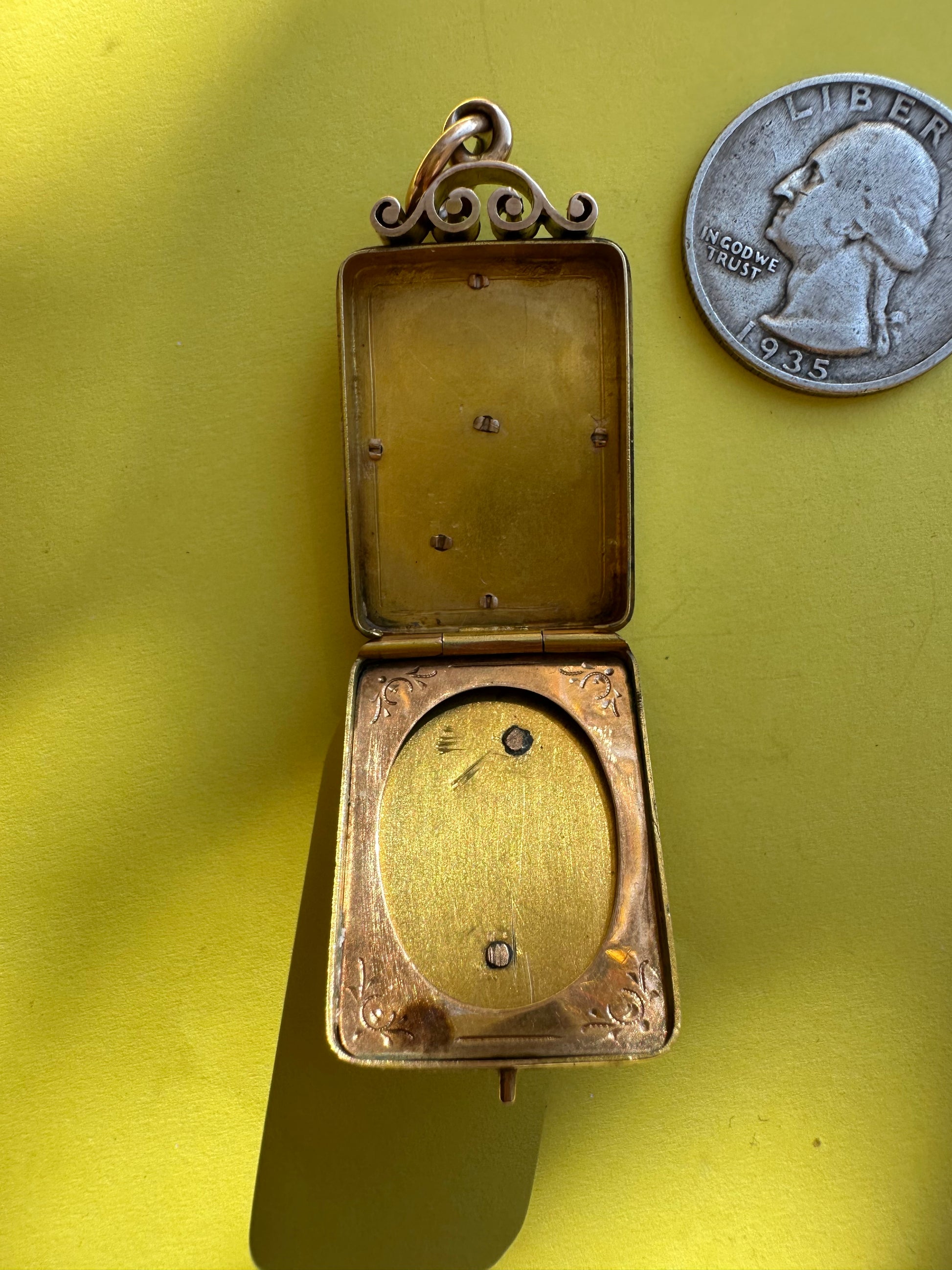 antique two sided locket with elk and monogram