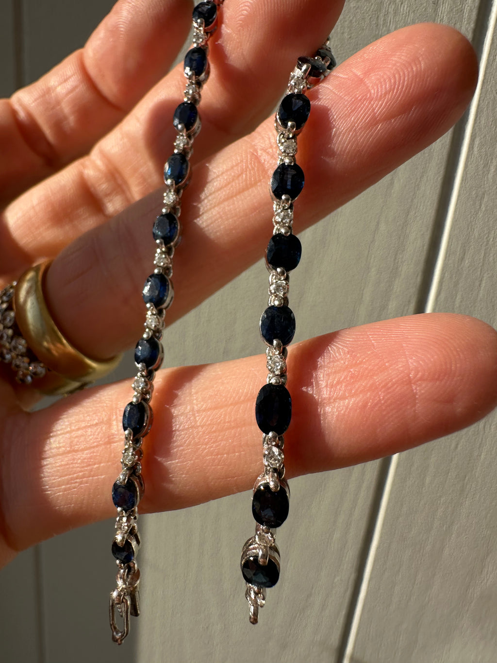 diamond and sapphire tennis bracelet