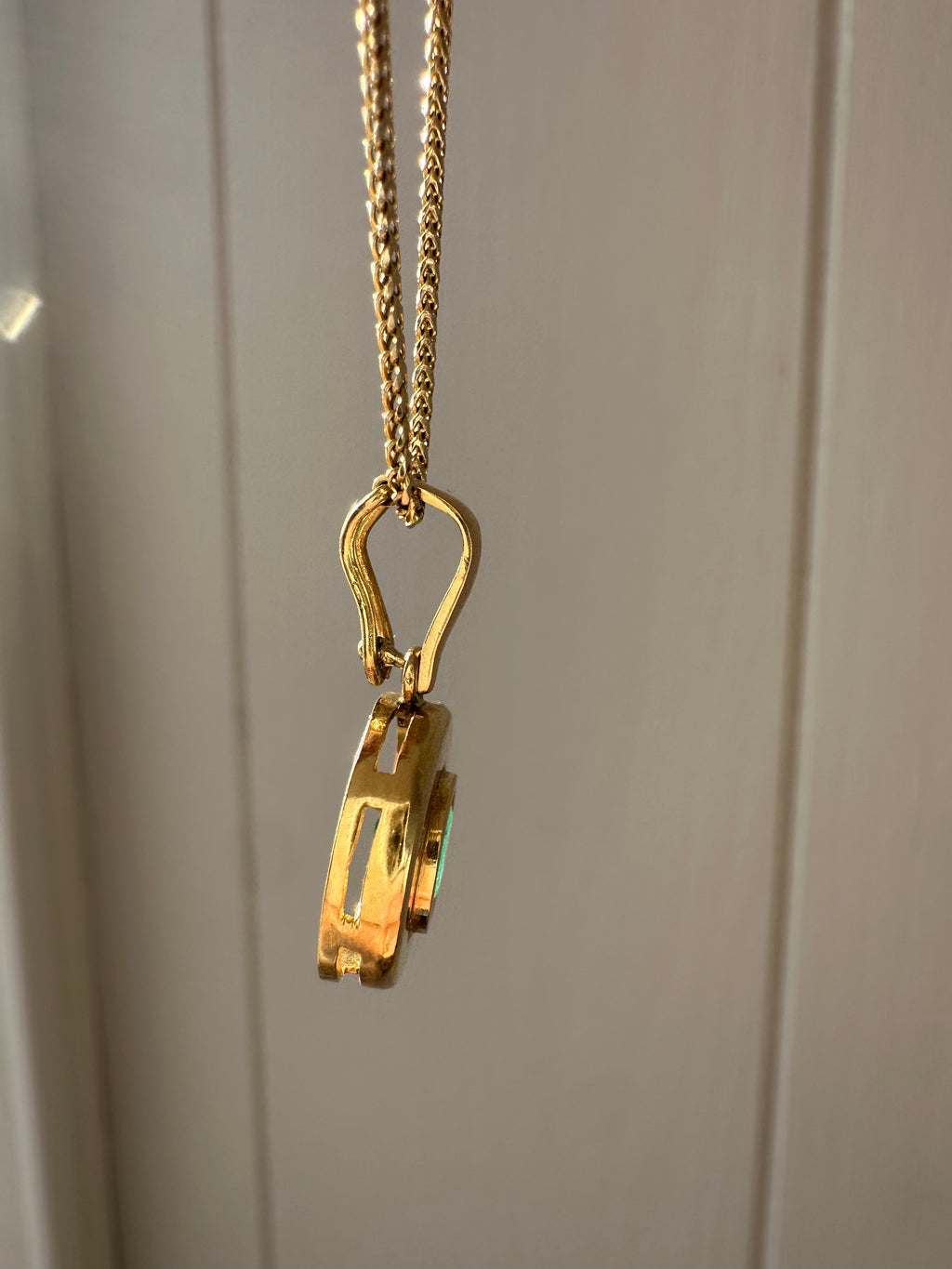 emerald in 18k bezel