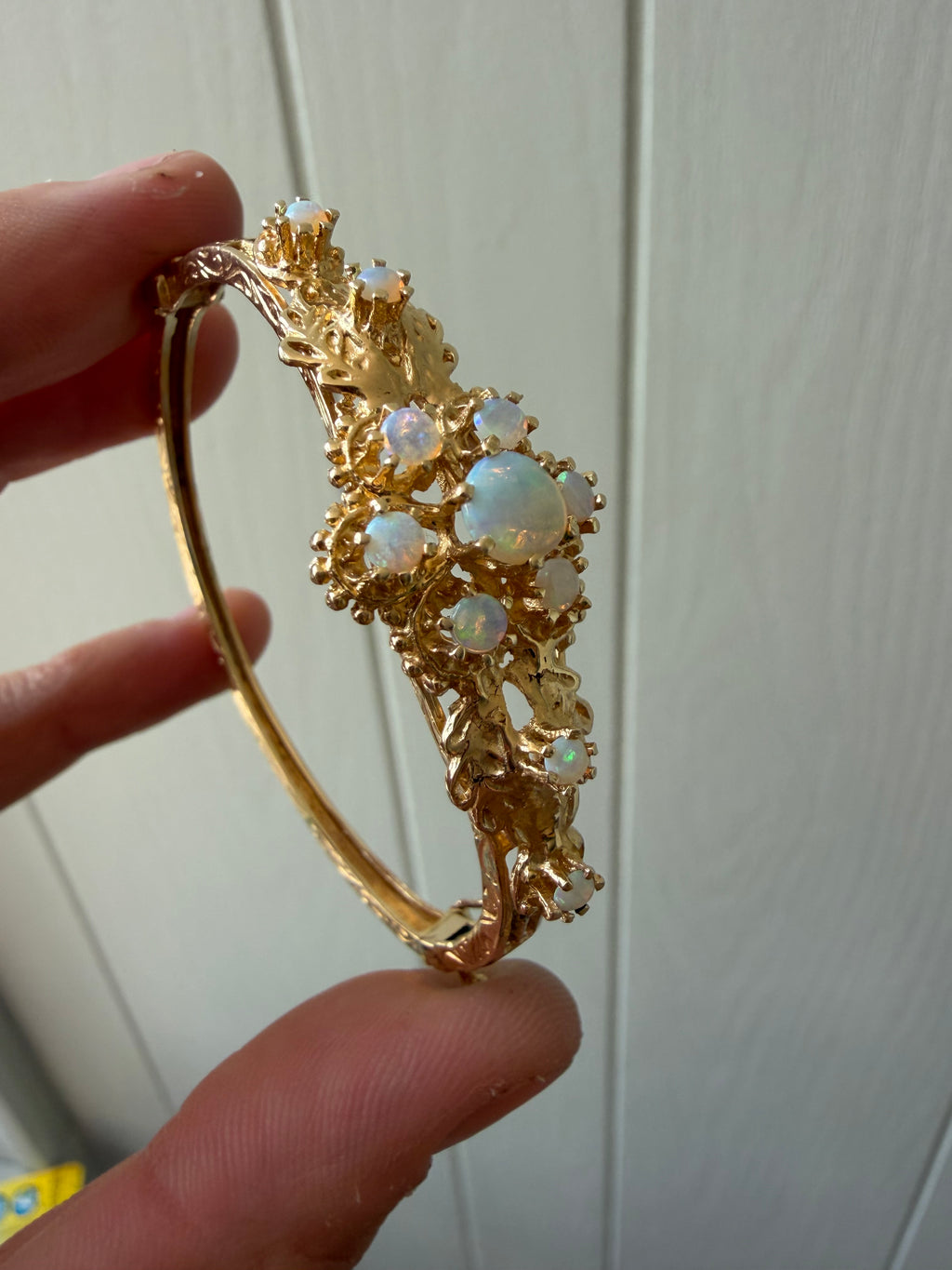 striking engraved opal burst hinge bangle
