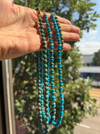 hand selected turquoise and gold strands
