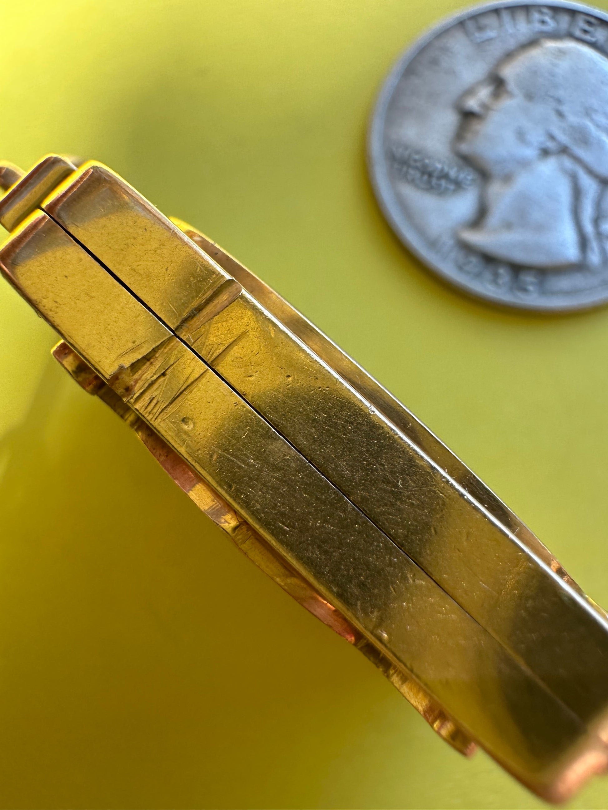 antique two sided locket with elk and monogram