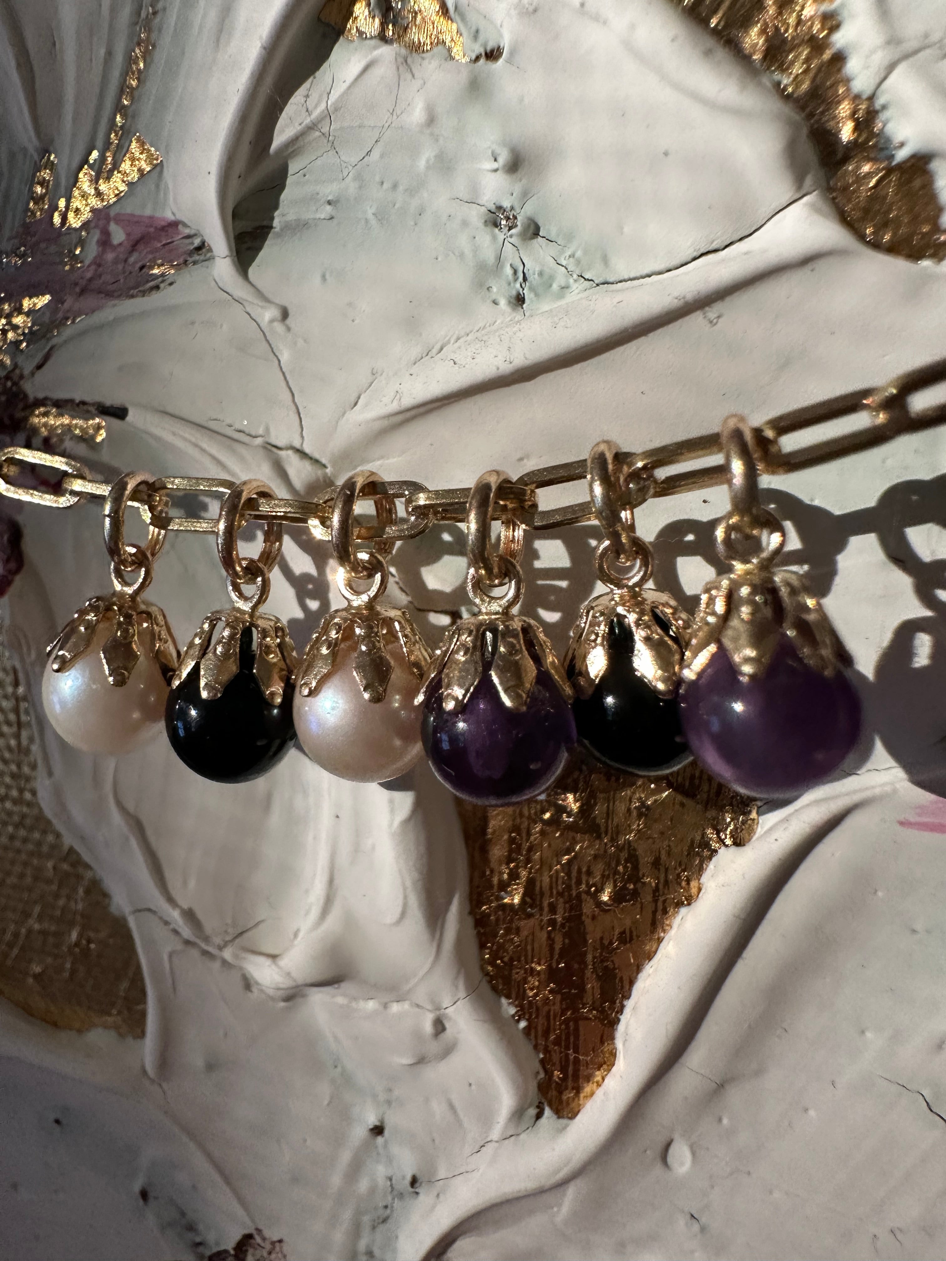 pearl, onyx and amethyst cabochon baubles