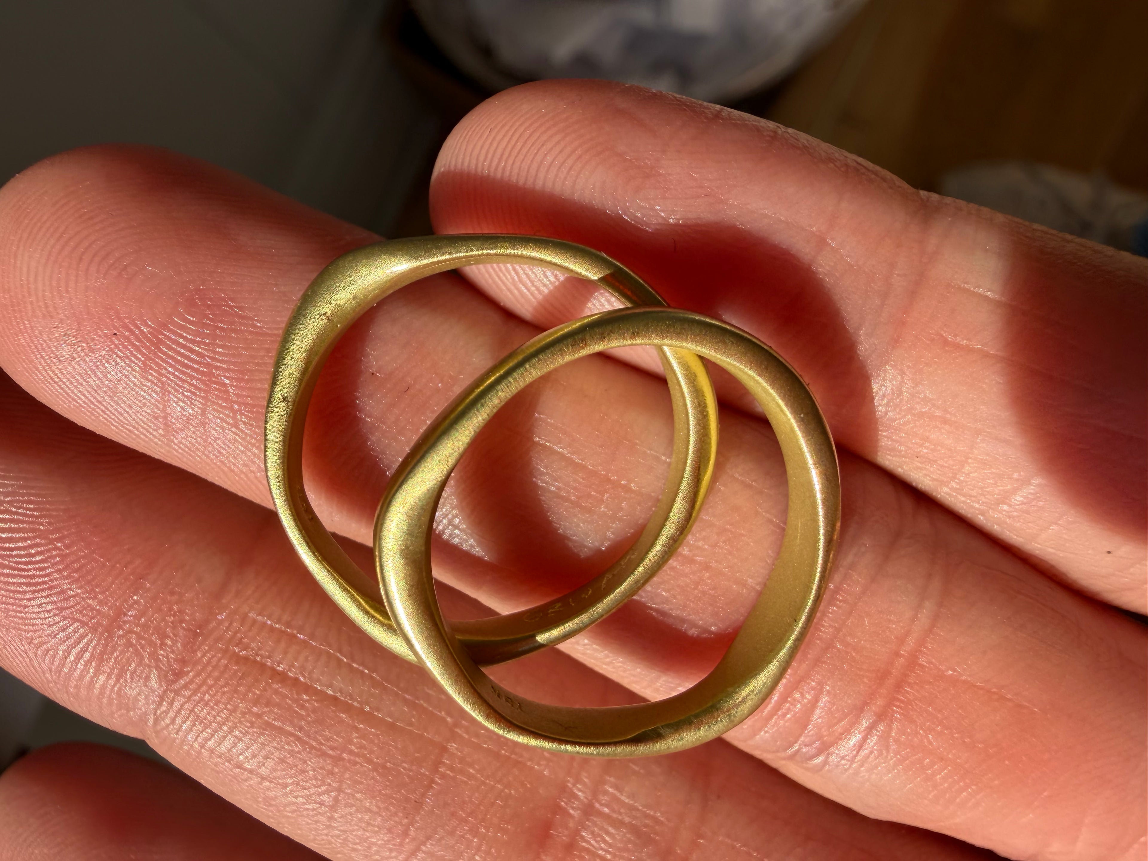 pair of 18k matte gold finish bands