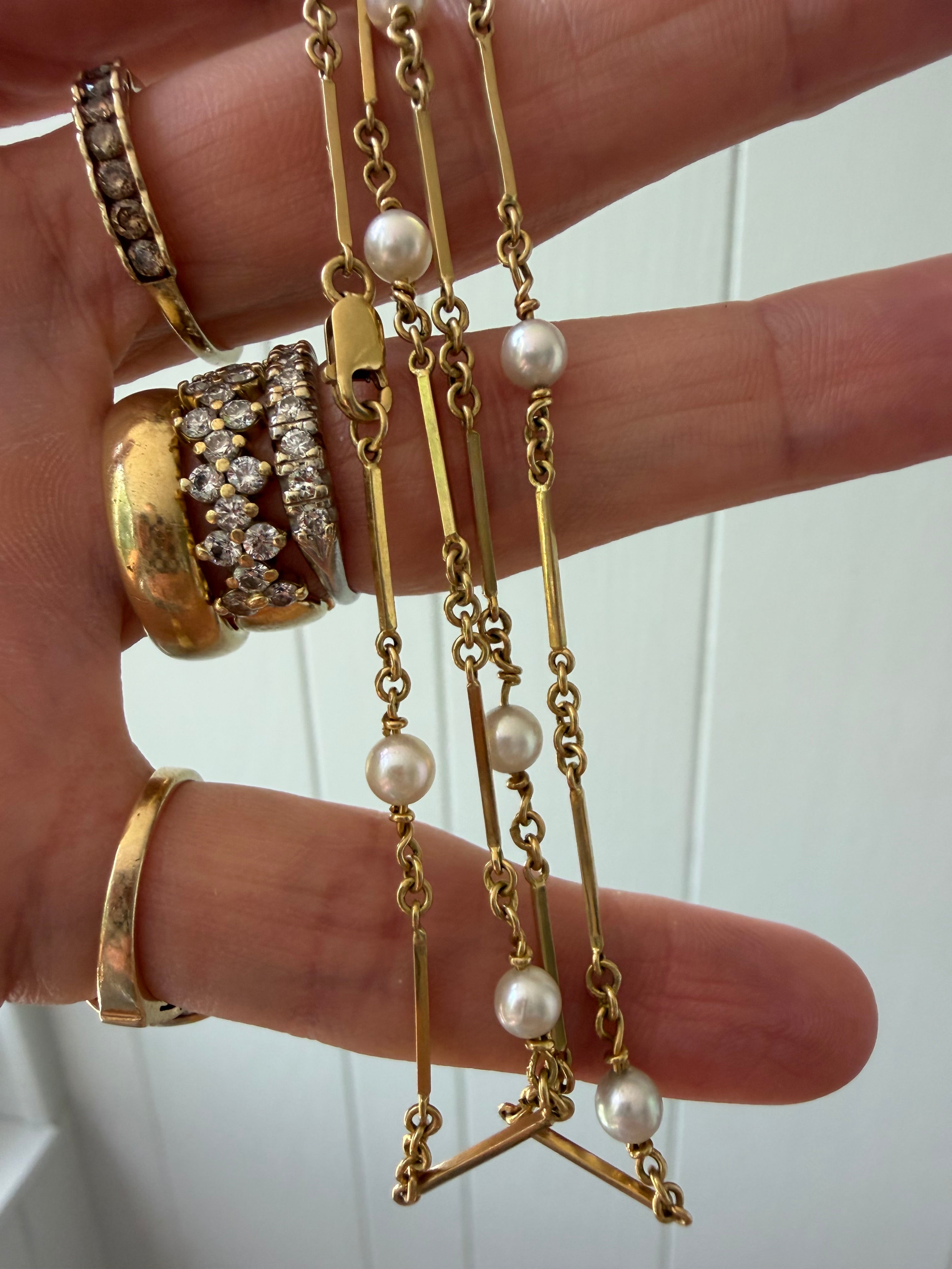 pearl and 18k gold station chain