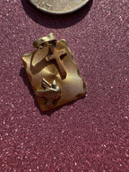 engine turned peace dove + cross charm