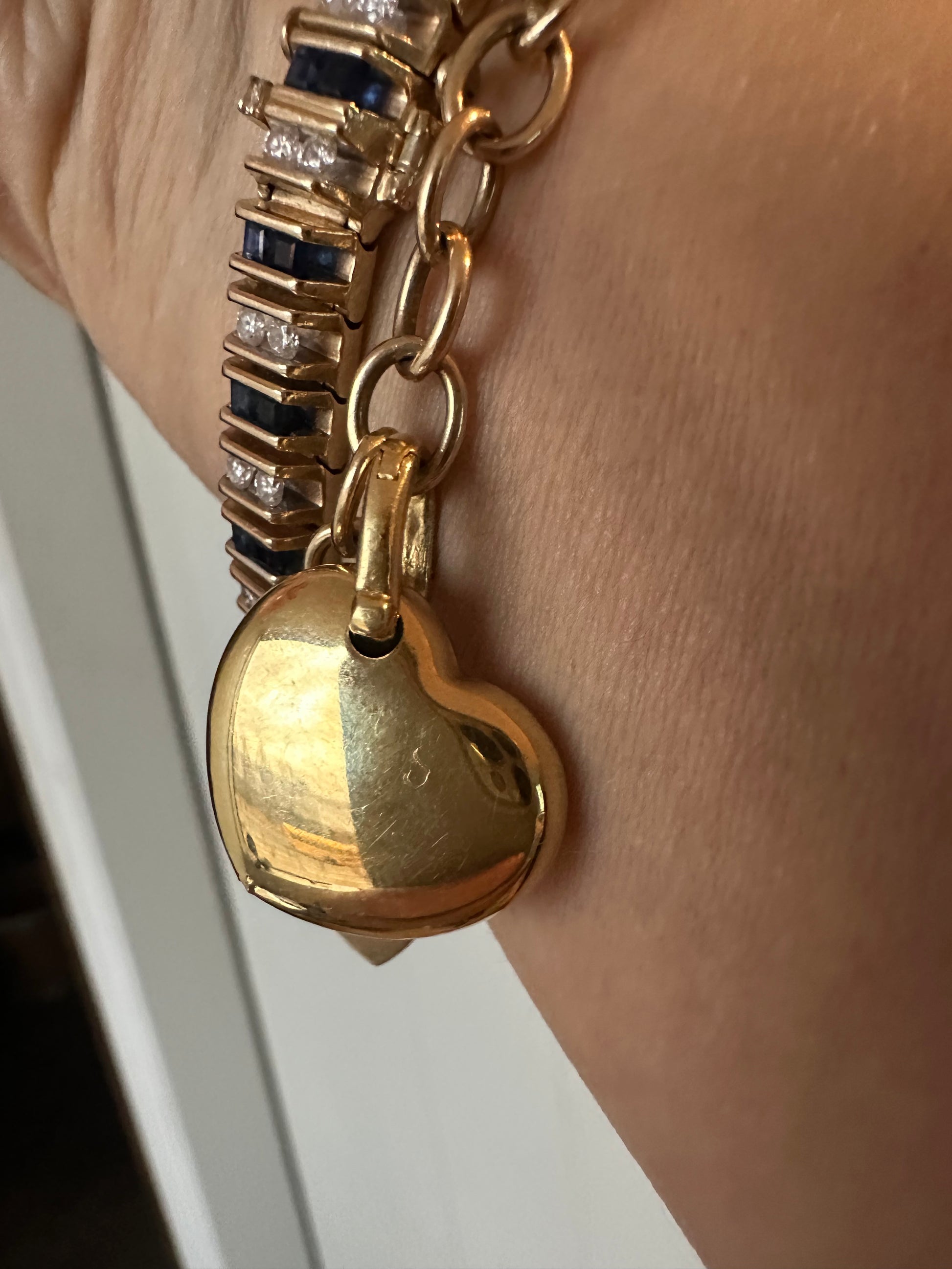 18k puffed heart with enhancer bail