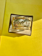 wide two tone band with star set diamonds