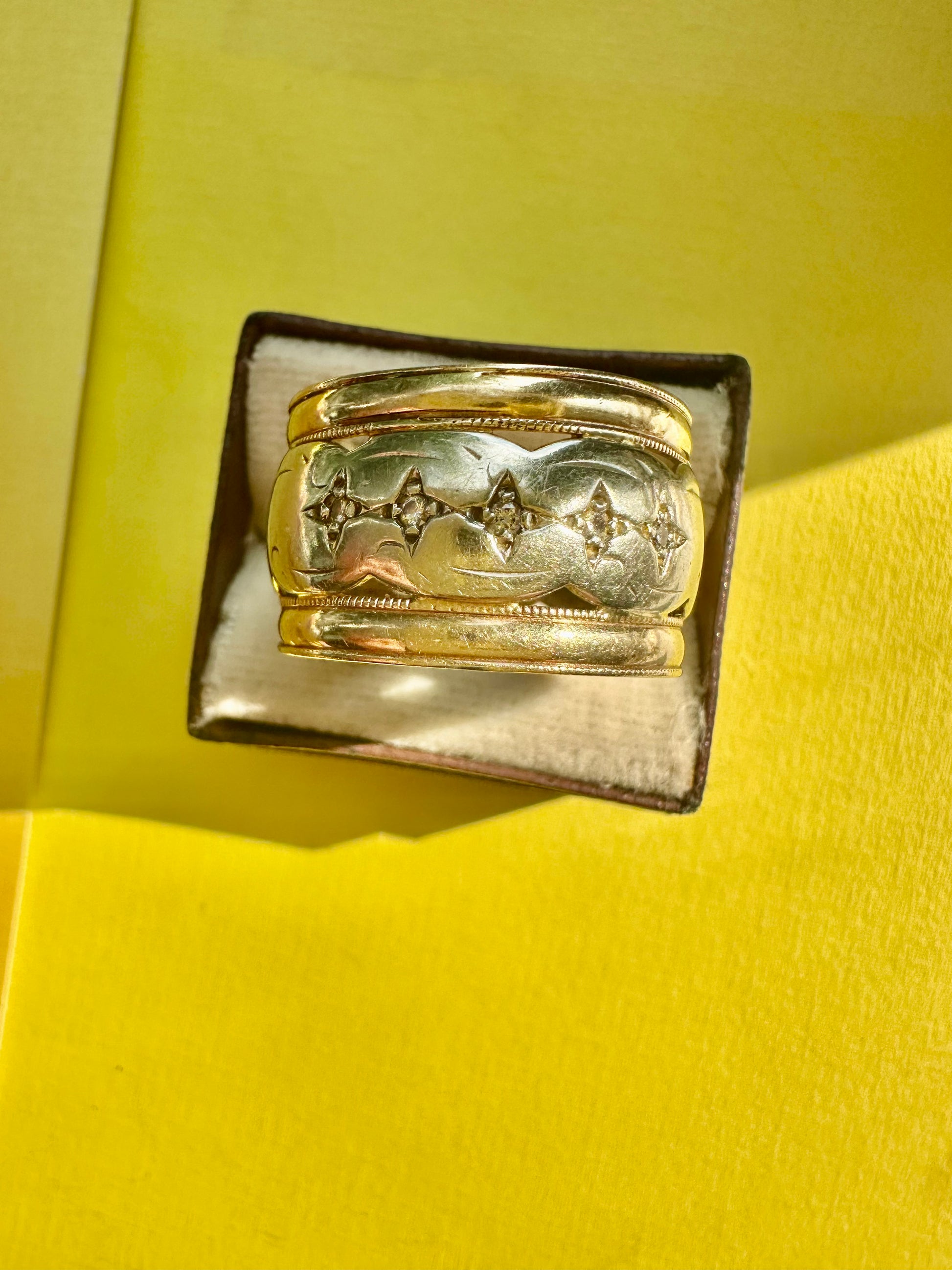 wide two tone band with star set diamonds