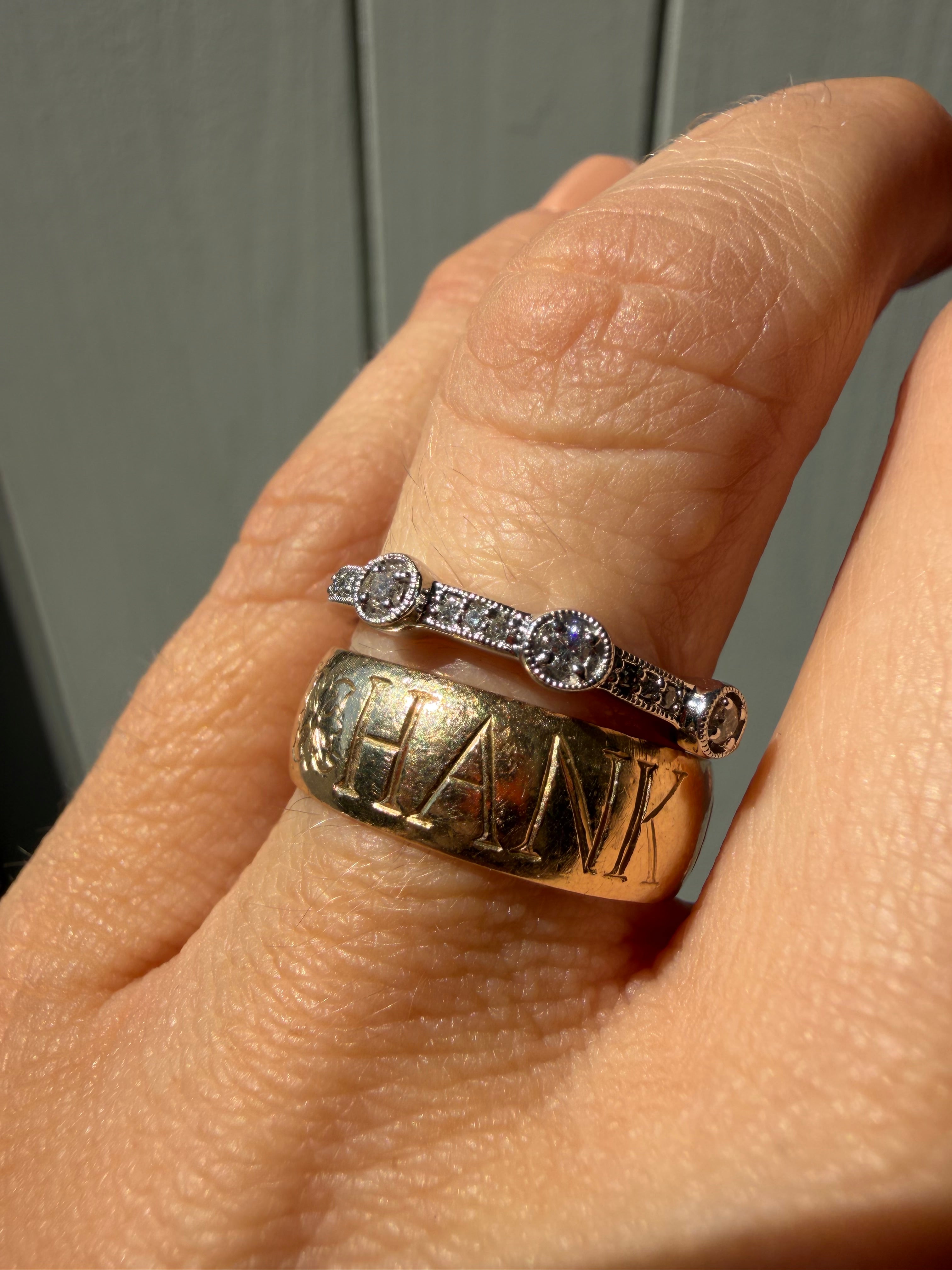 white gold ring with 3 bezel set diamonds