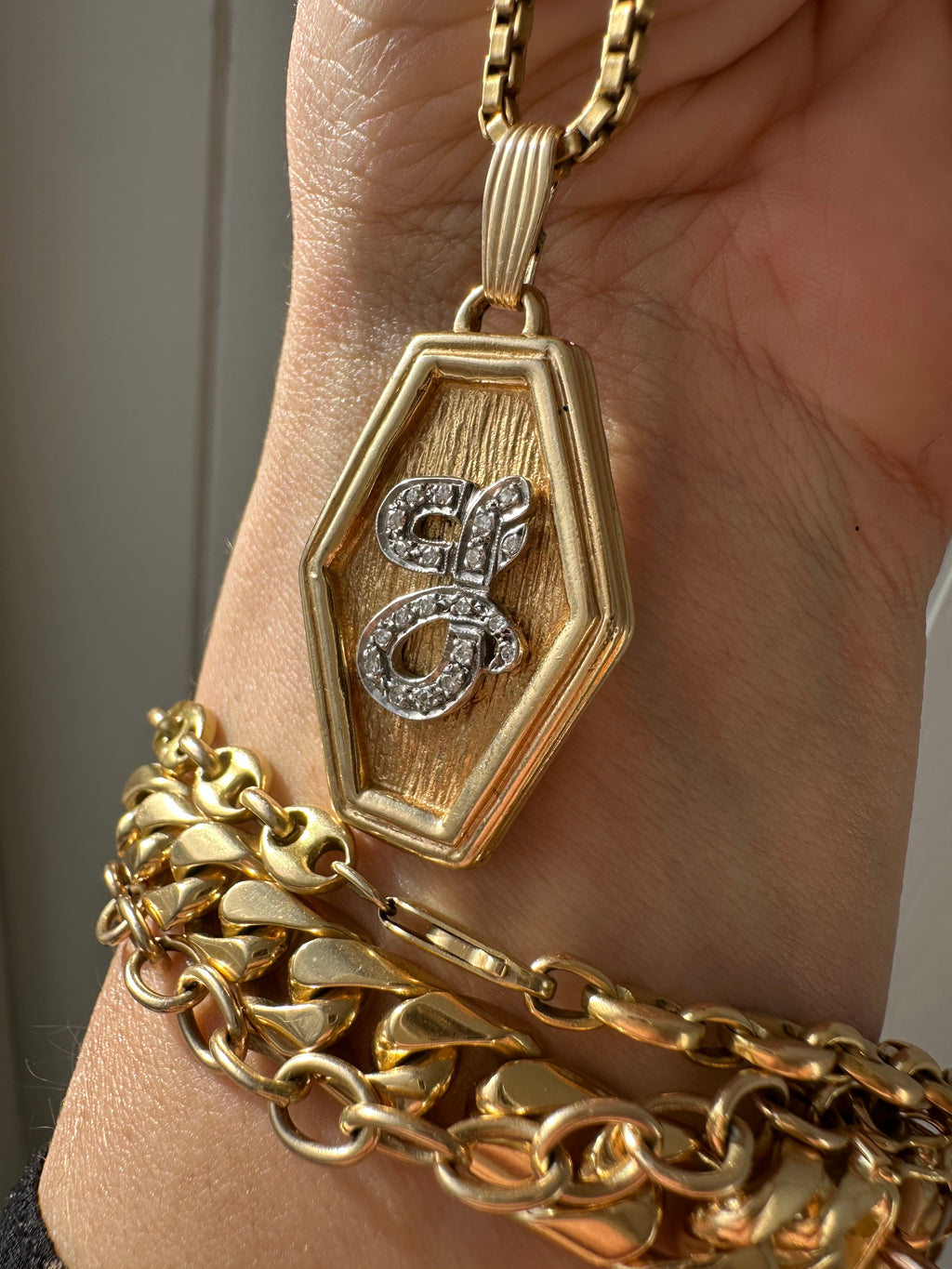 diamond J pendant
