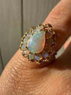 pear opal with opal halo cocktail ring