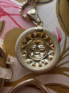 knurled textured sun charm