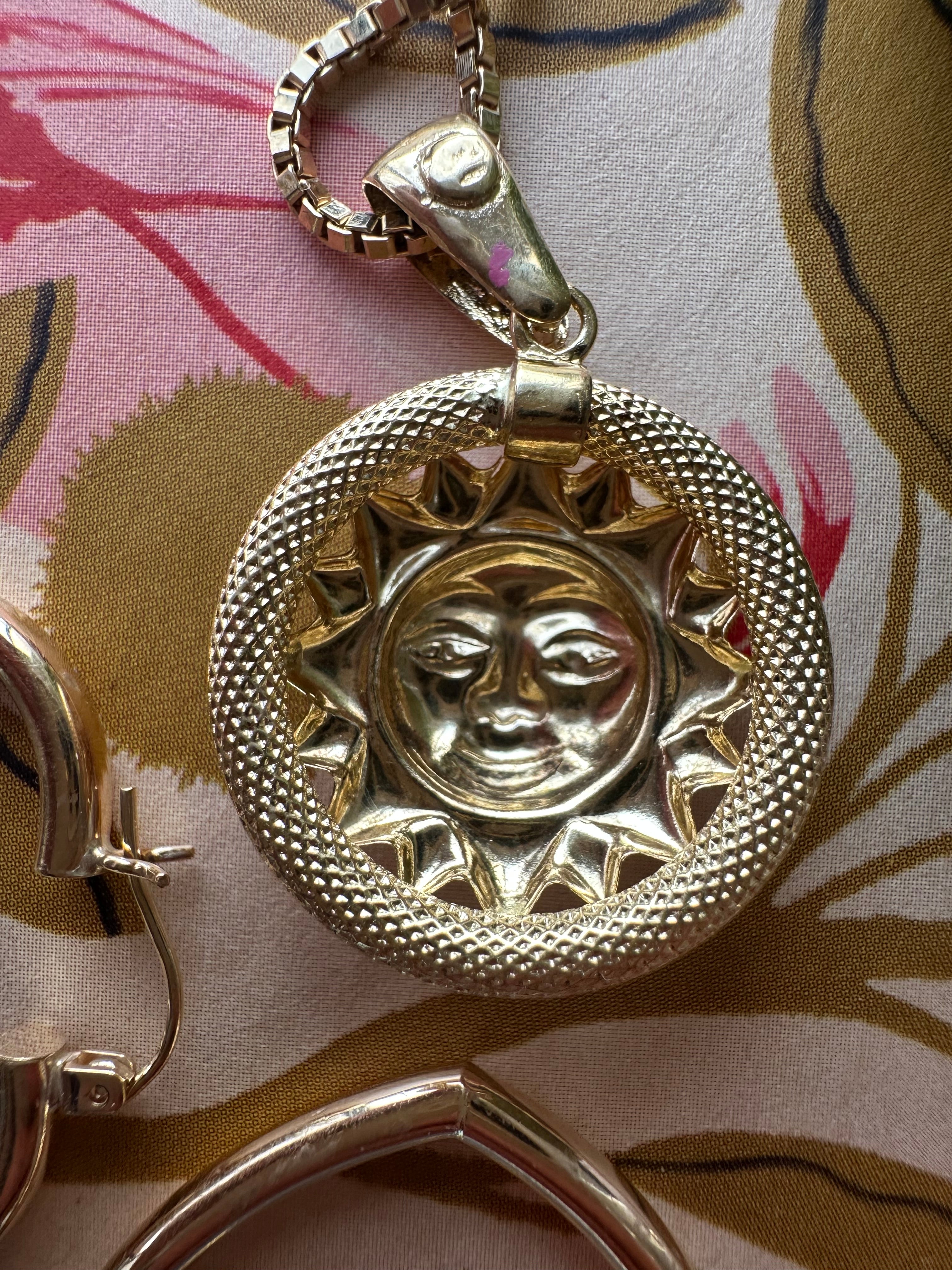 knurled textured sun charm