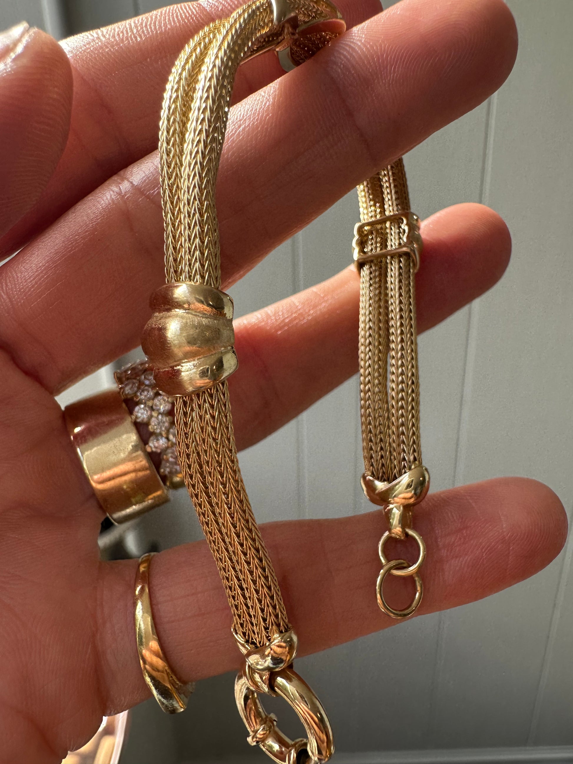 mesh bracelet with x and bar stations