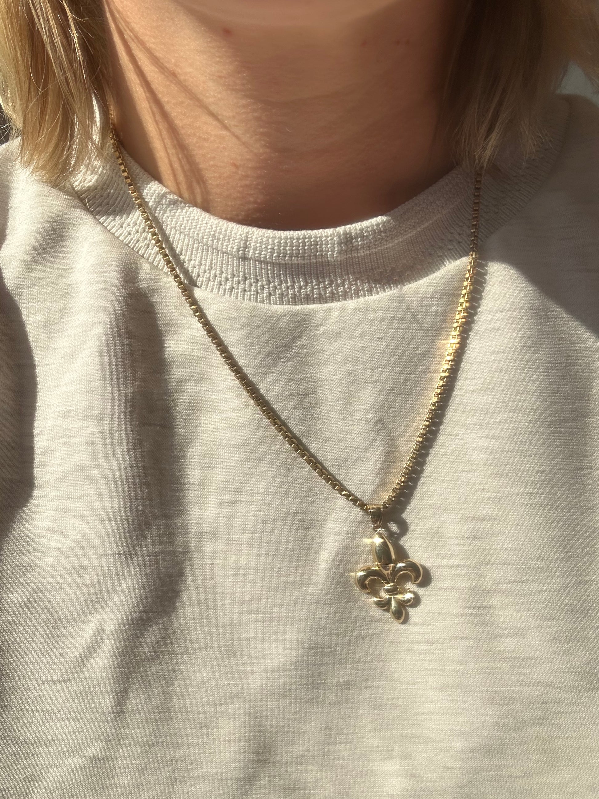 ruby heart, 18k gold open heart and fleur de lis charms