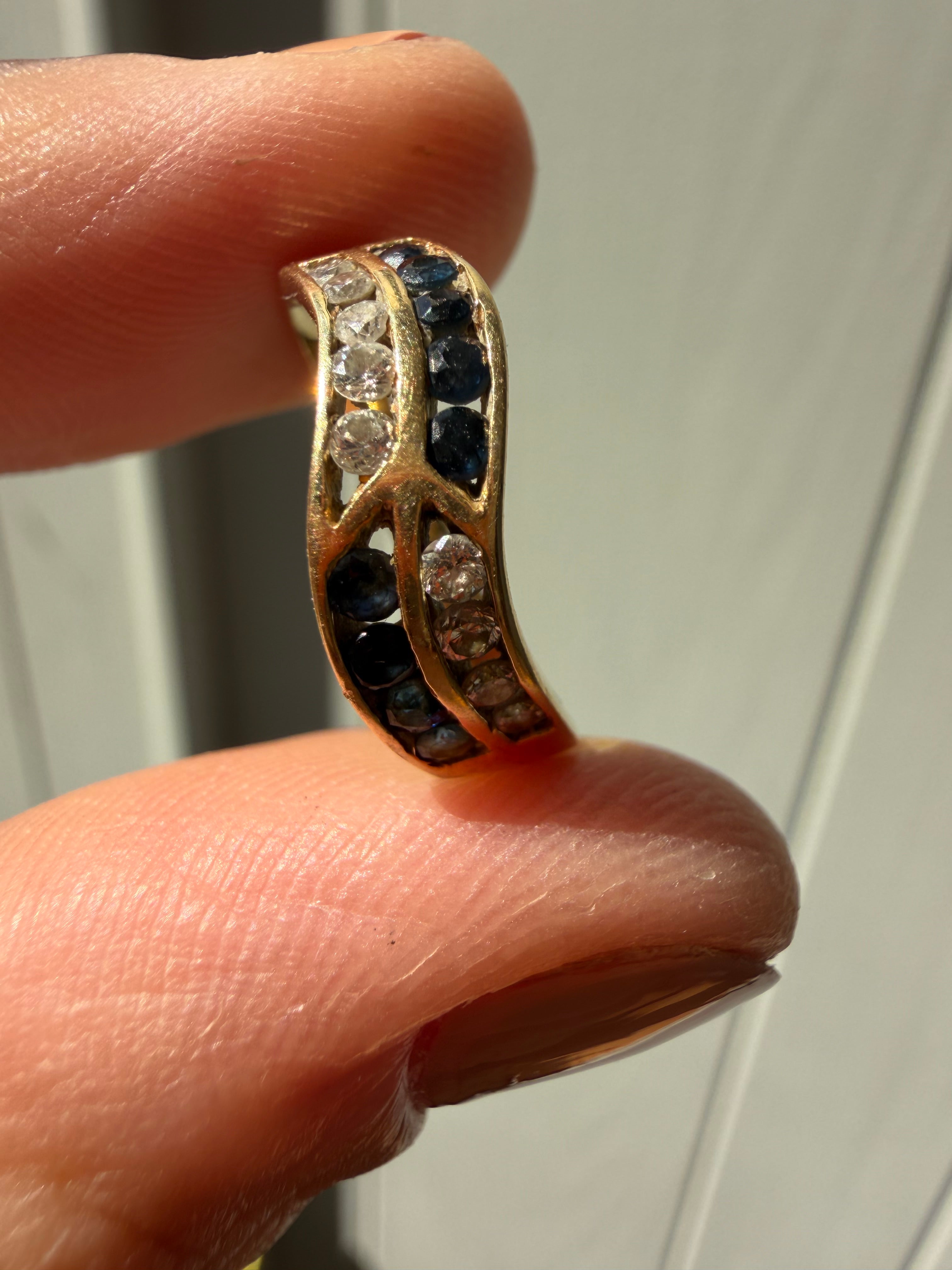 diamond and sapphire swoop ring