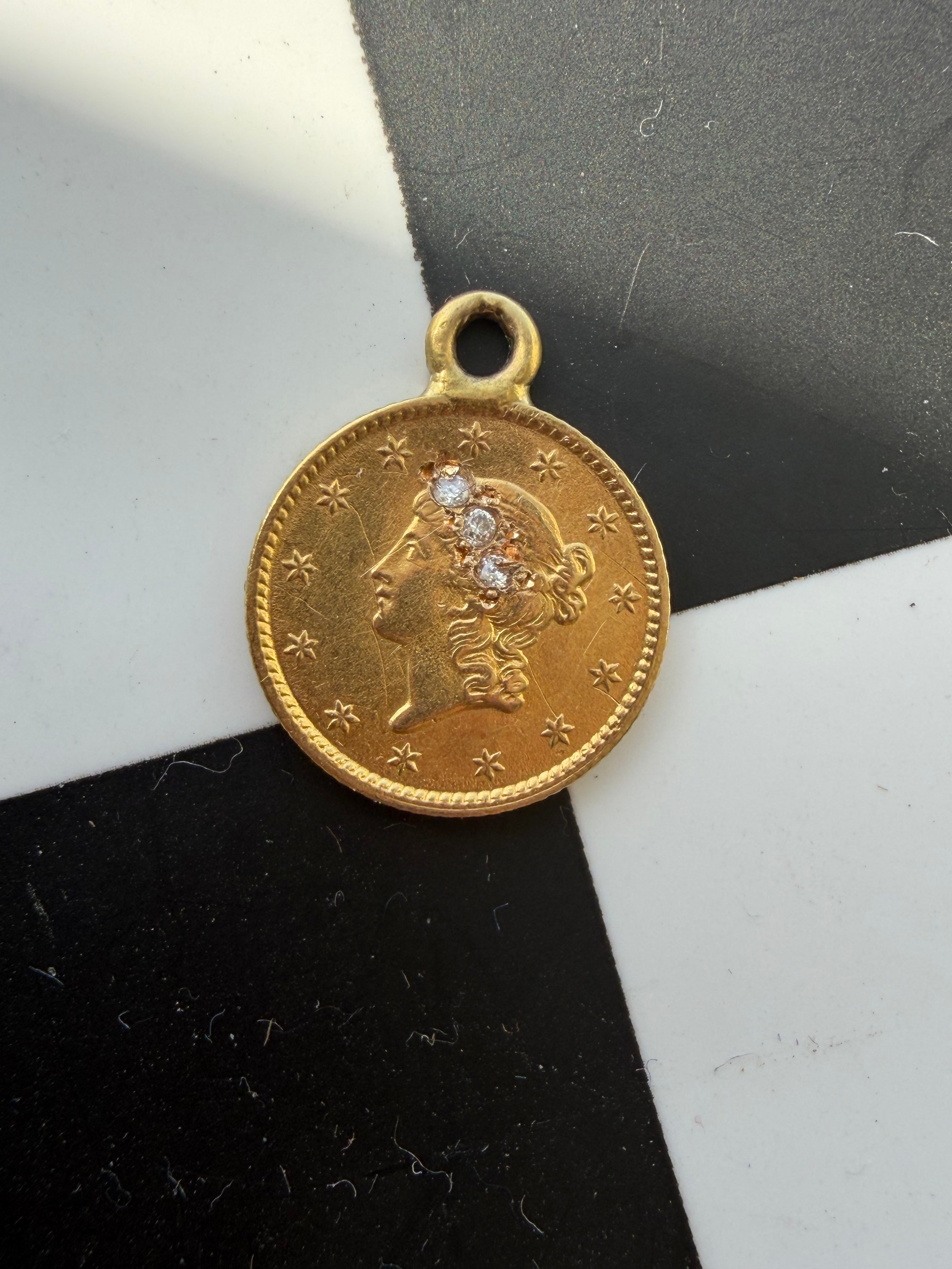 diamond adorned antique US Liberty coins