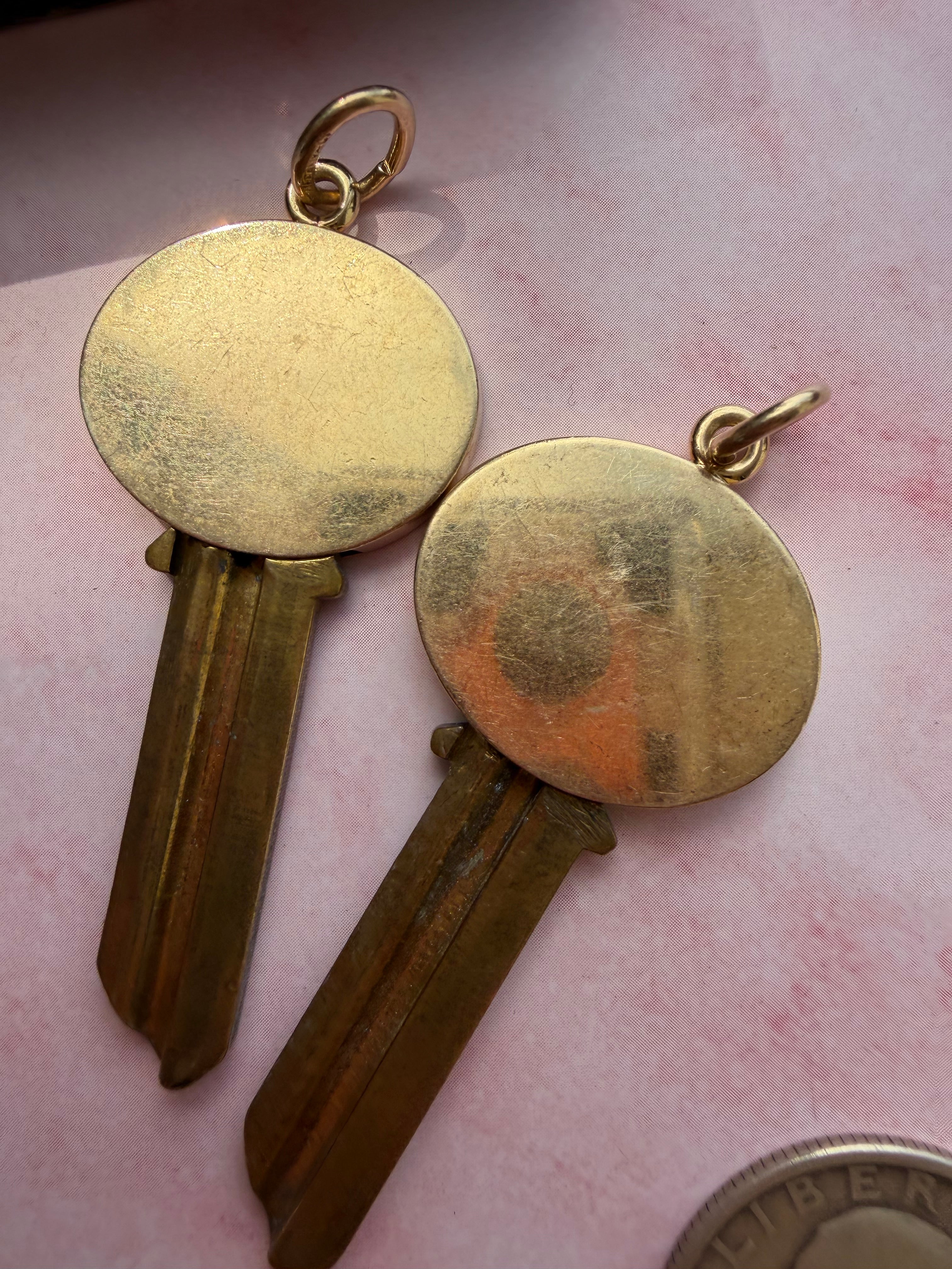 antique oval key pendant by Tiffany & Co.
