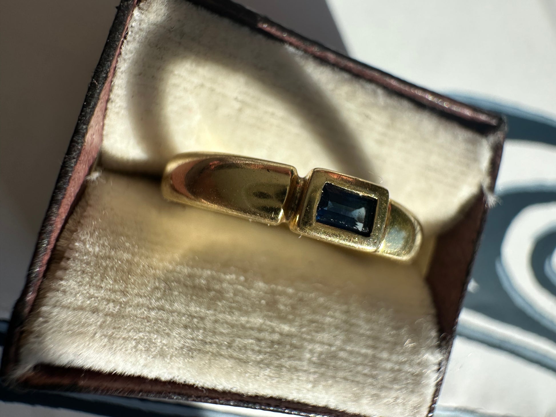 east west bezel set sapphire band