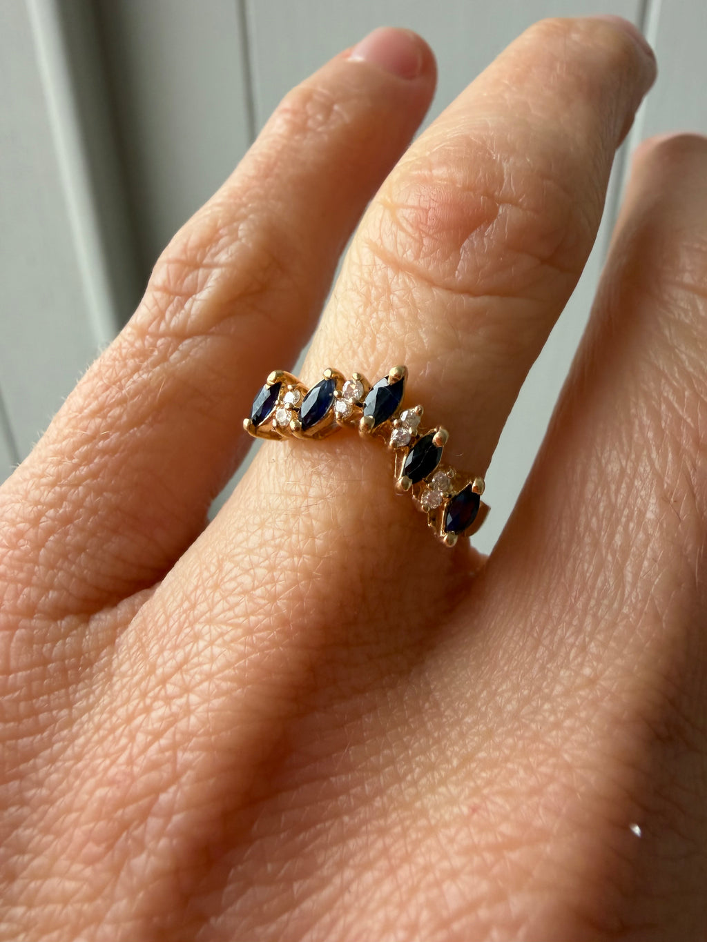 V shaped diamond and sapphire ring