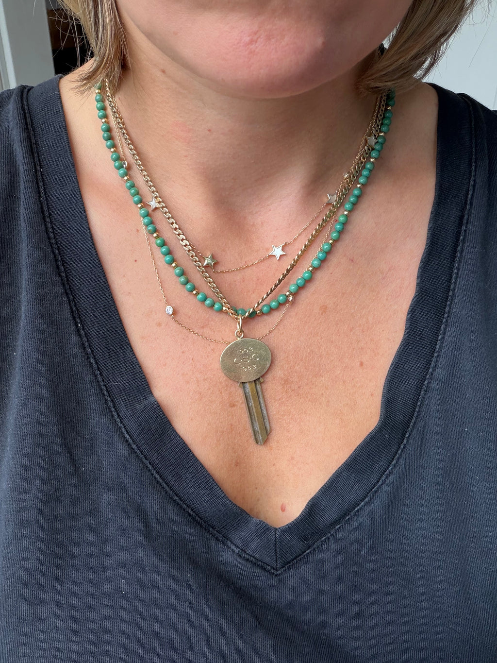 antique oval key pendant by Tiffany & Co.