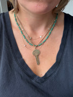 antique oval key pendant by Tiffany & Co.