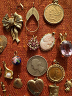 plethora of vintage gold charms