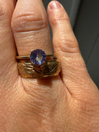 round cut solitaire tanzanite in 9k gold