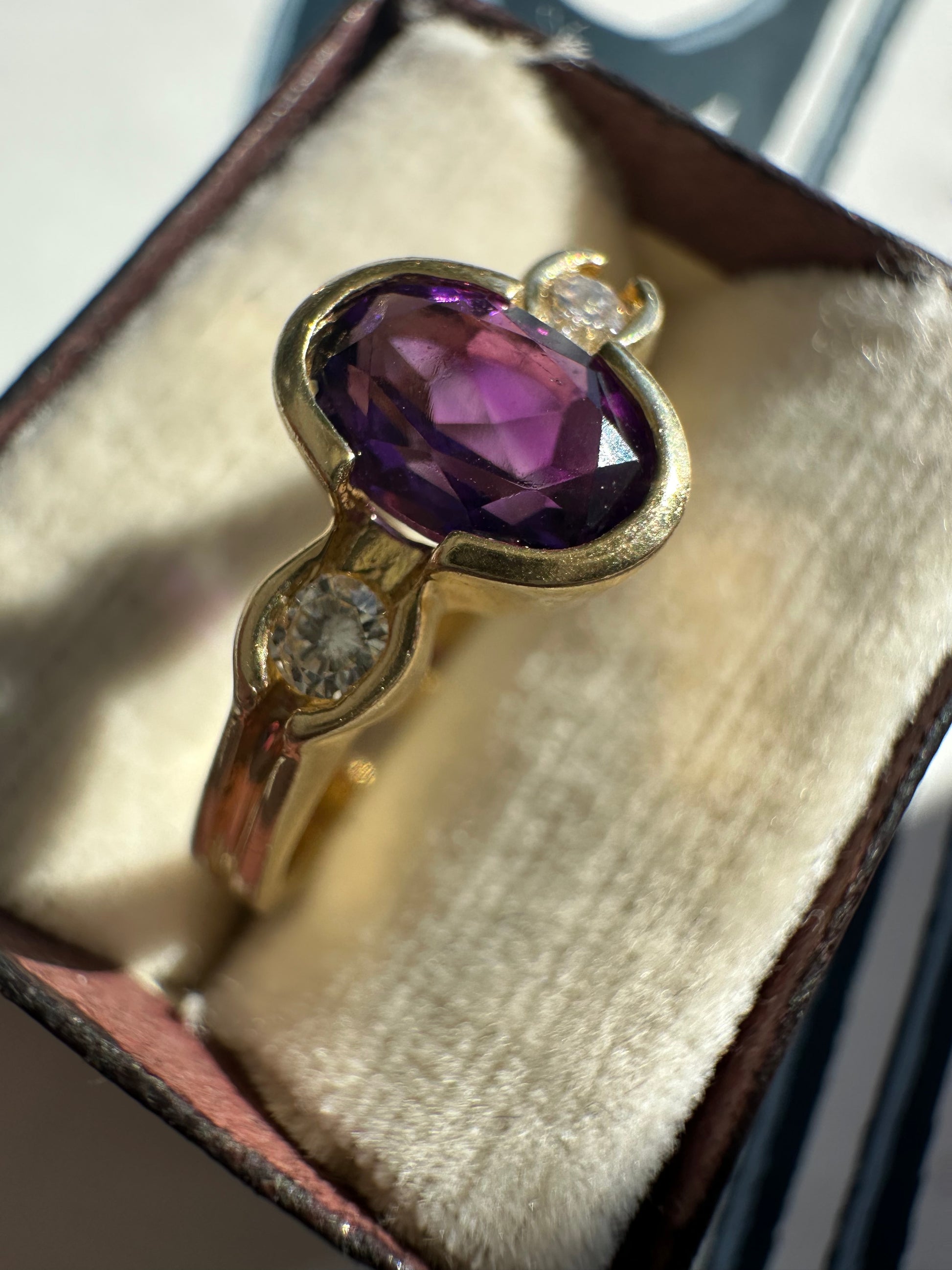 bezel set amethyst and diamond ring