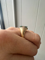 emerald and diamond navette style ring