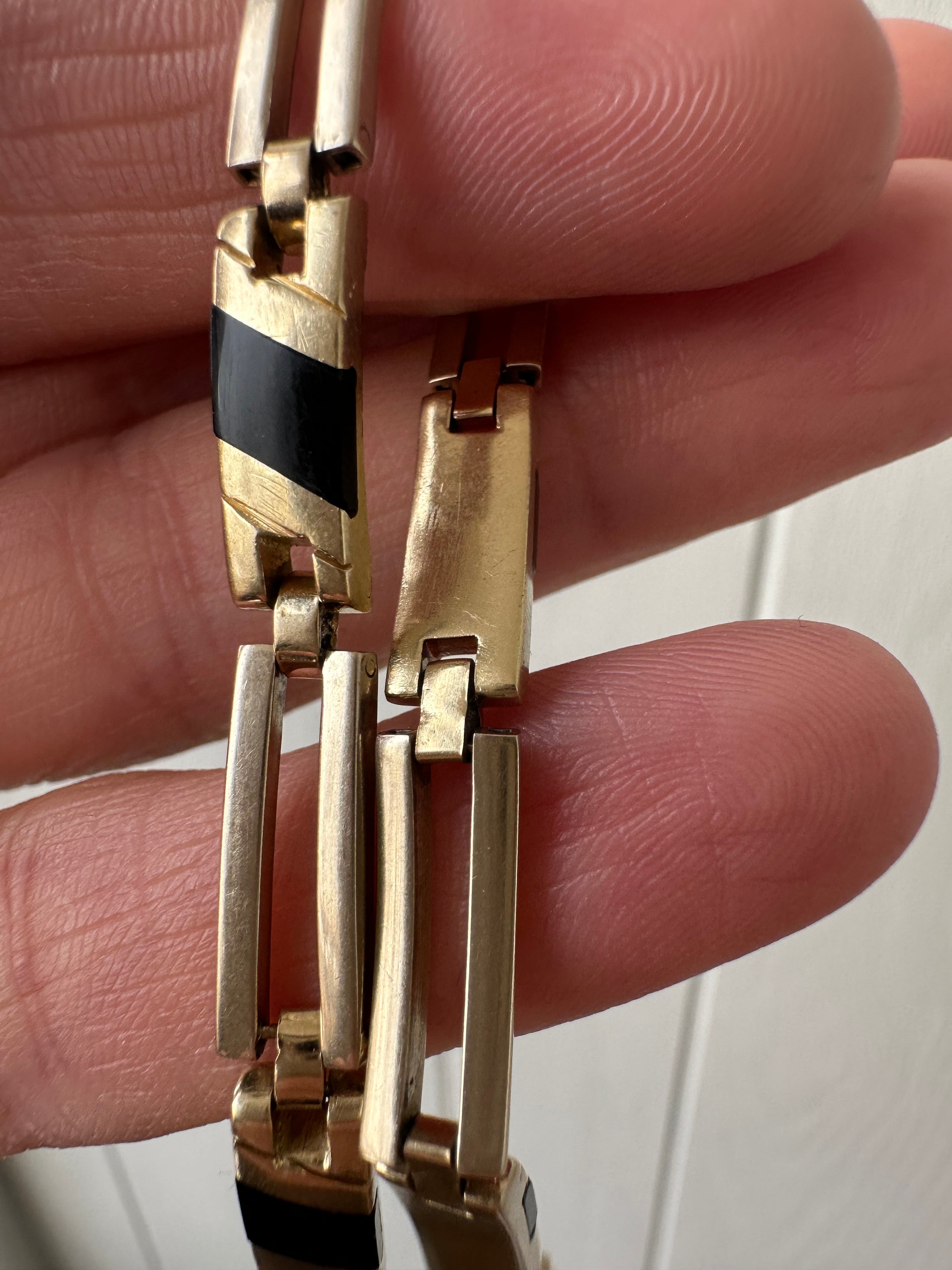 onyx inlay and gold bracelet