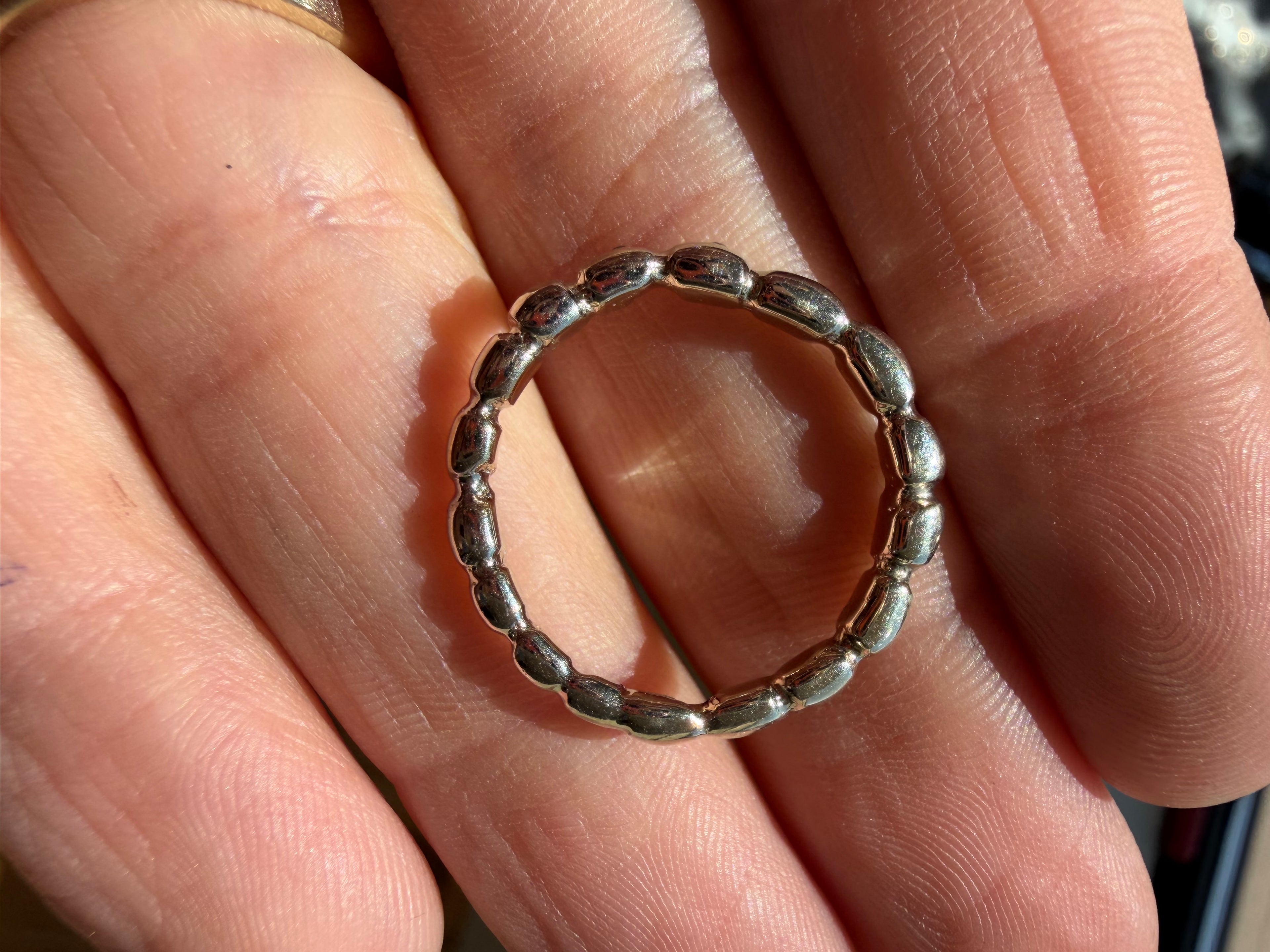 white gold bead band with blue and white diamonds