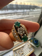 emerald and diamond navette style ring