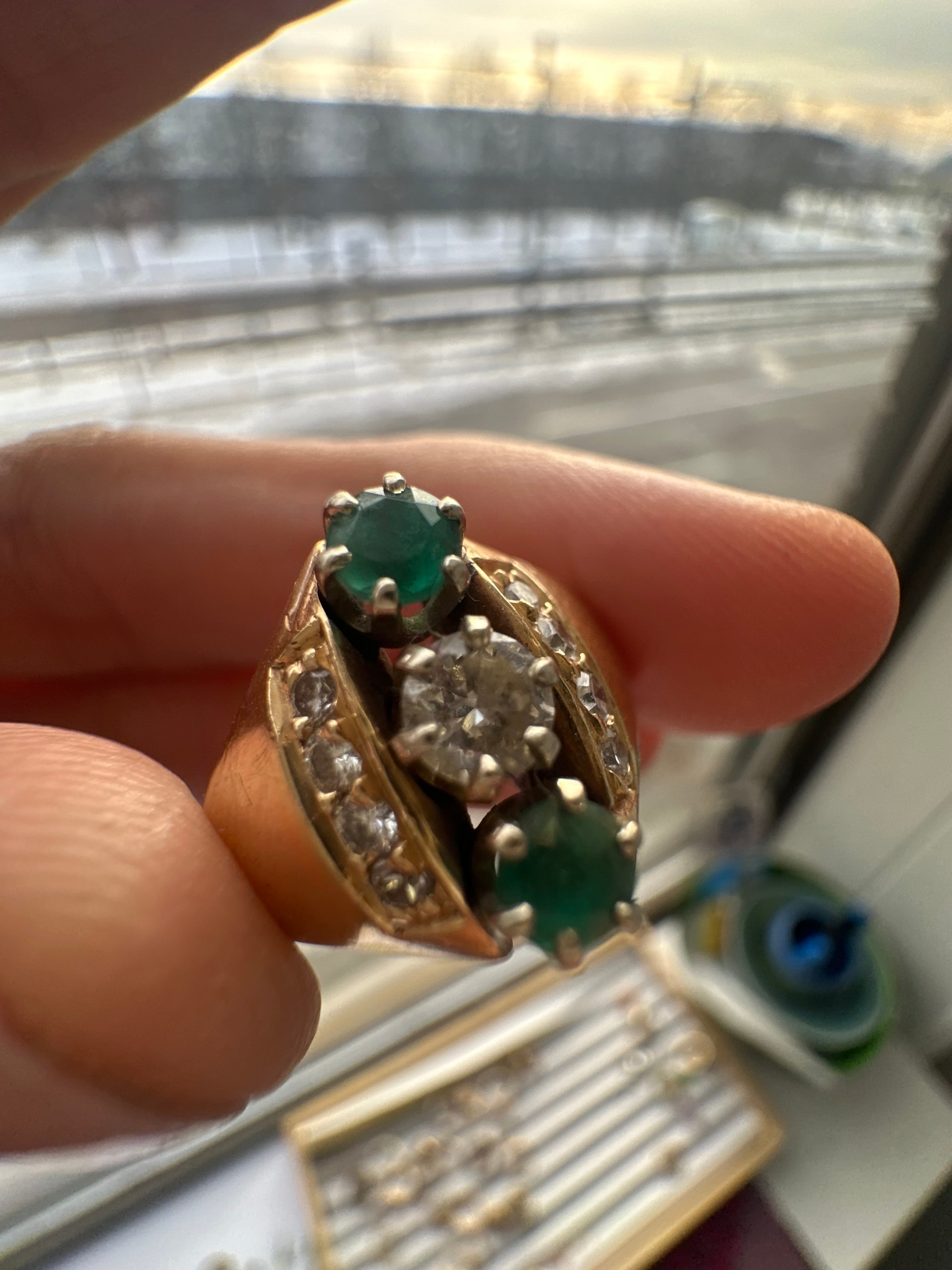 emerald and diamond navette style ring
