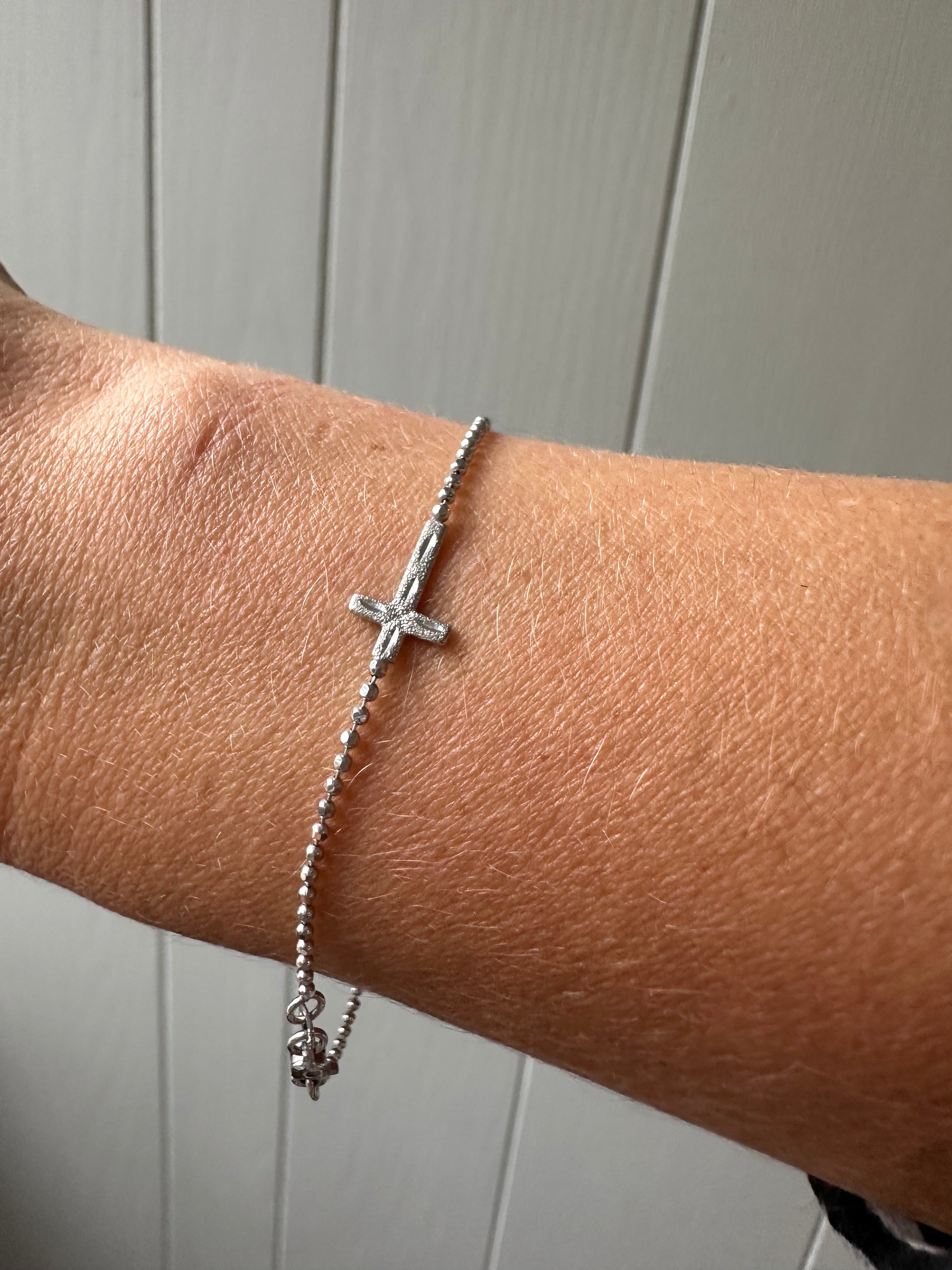 white gold cross bracelet