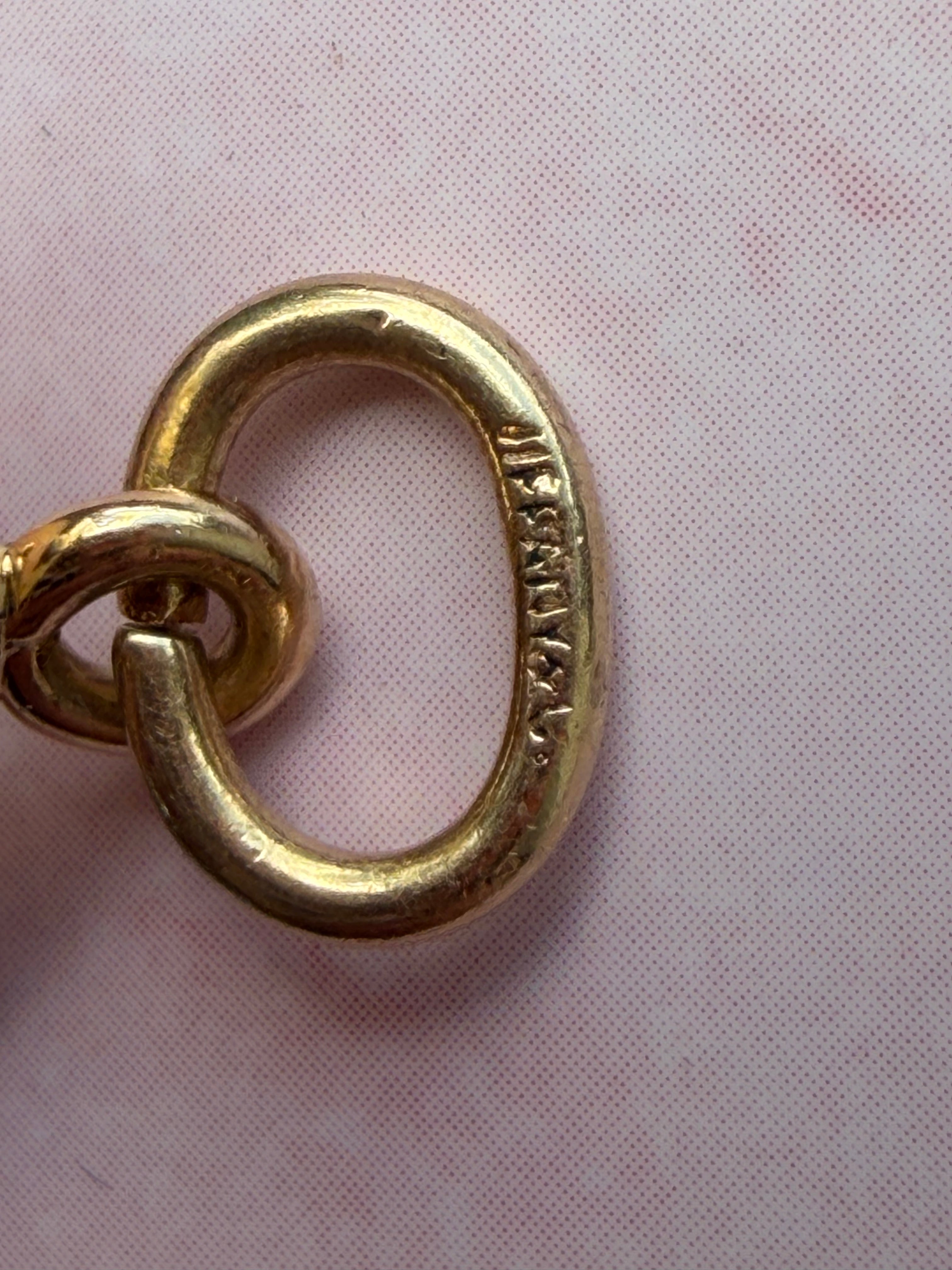 antique oval key pendant by Tiffany & Co.