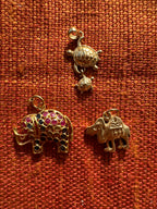 plethora of vintage gold charms