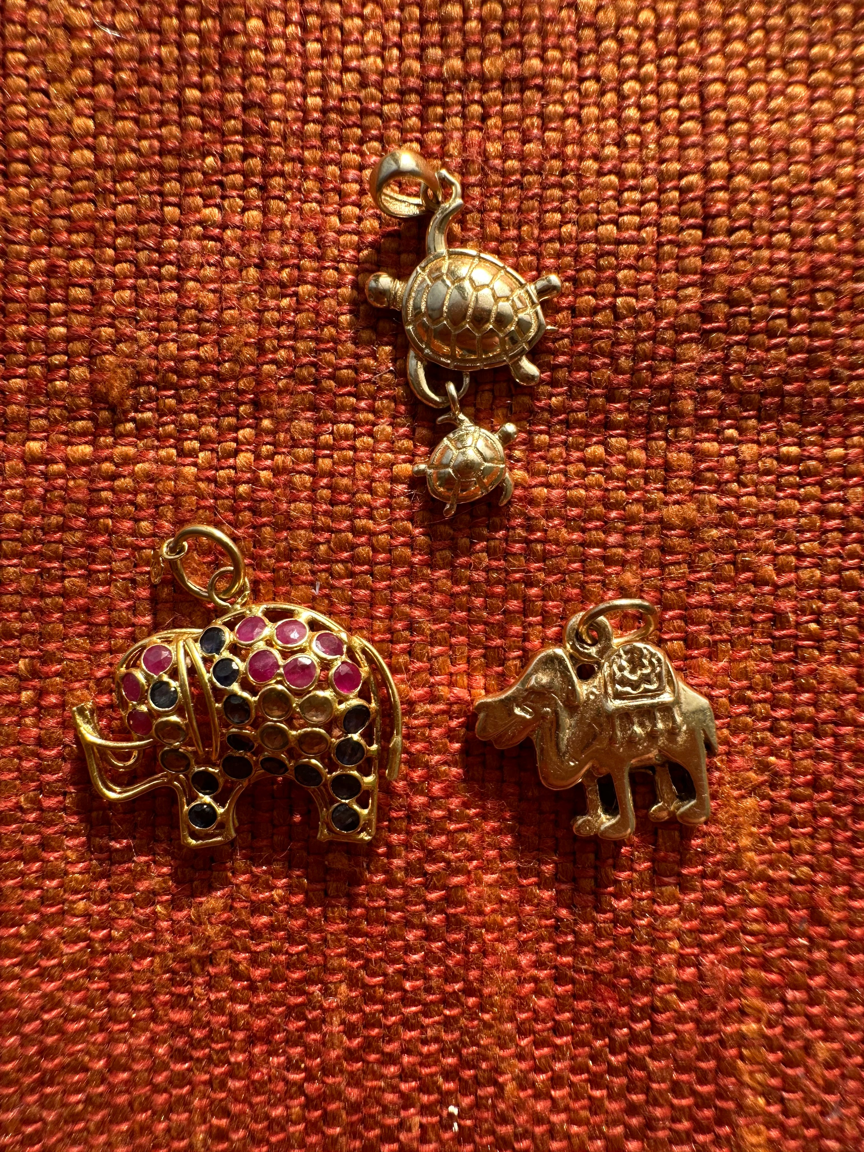 plethora of vintage gold charms