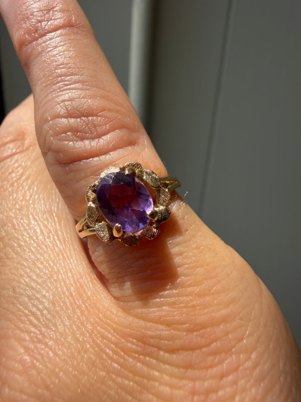 oval amethyst with florentine halo ring