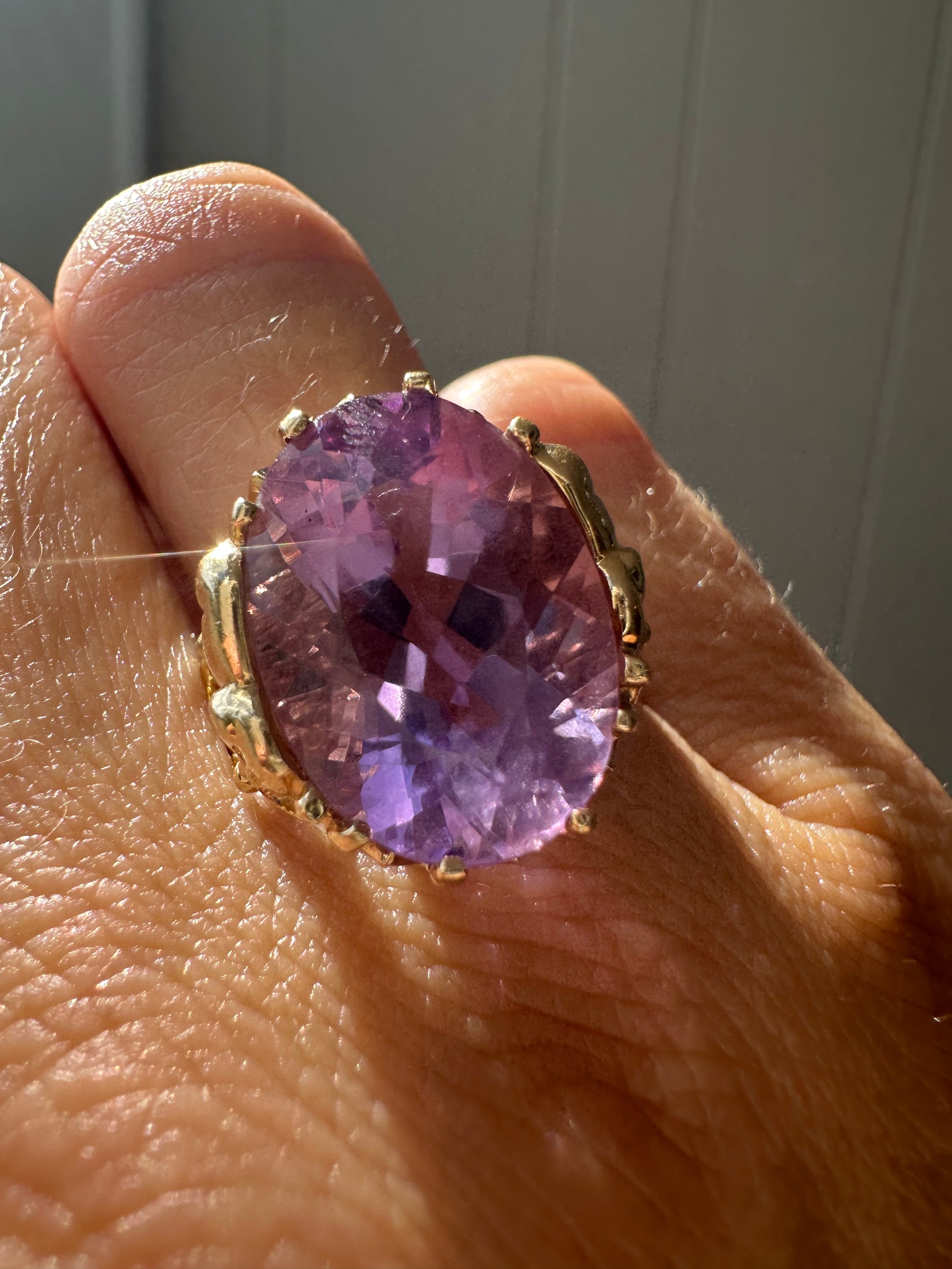 amethyst cocktail ring with elephant mounting