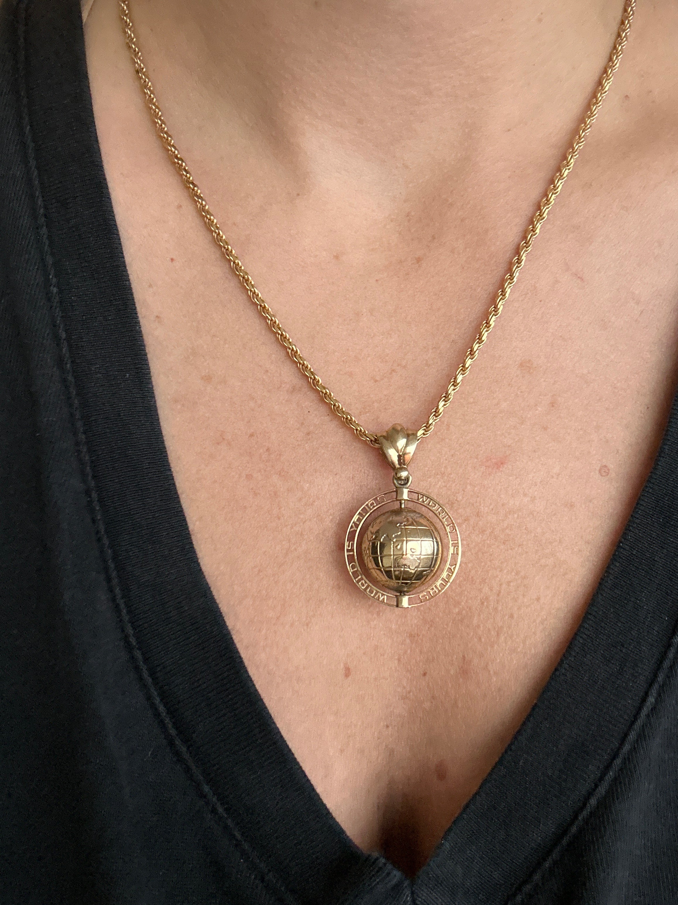 spinning globe charm