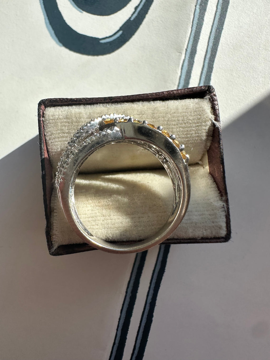 yellow sapphire and diamond crossover ring