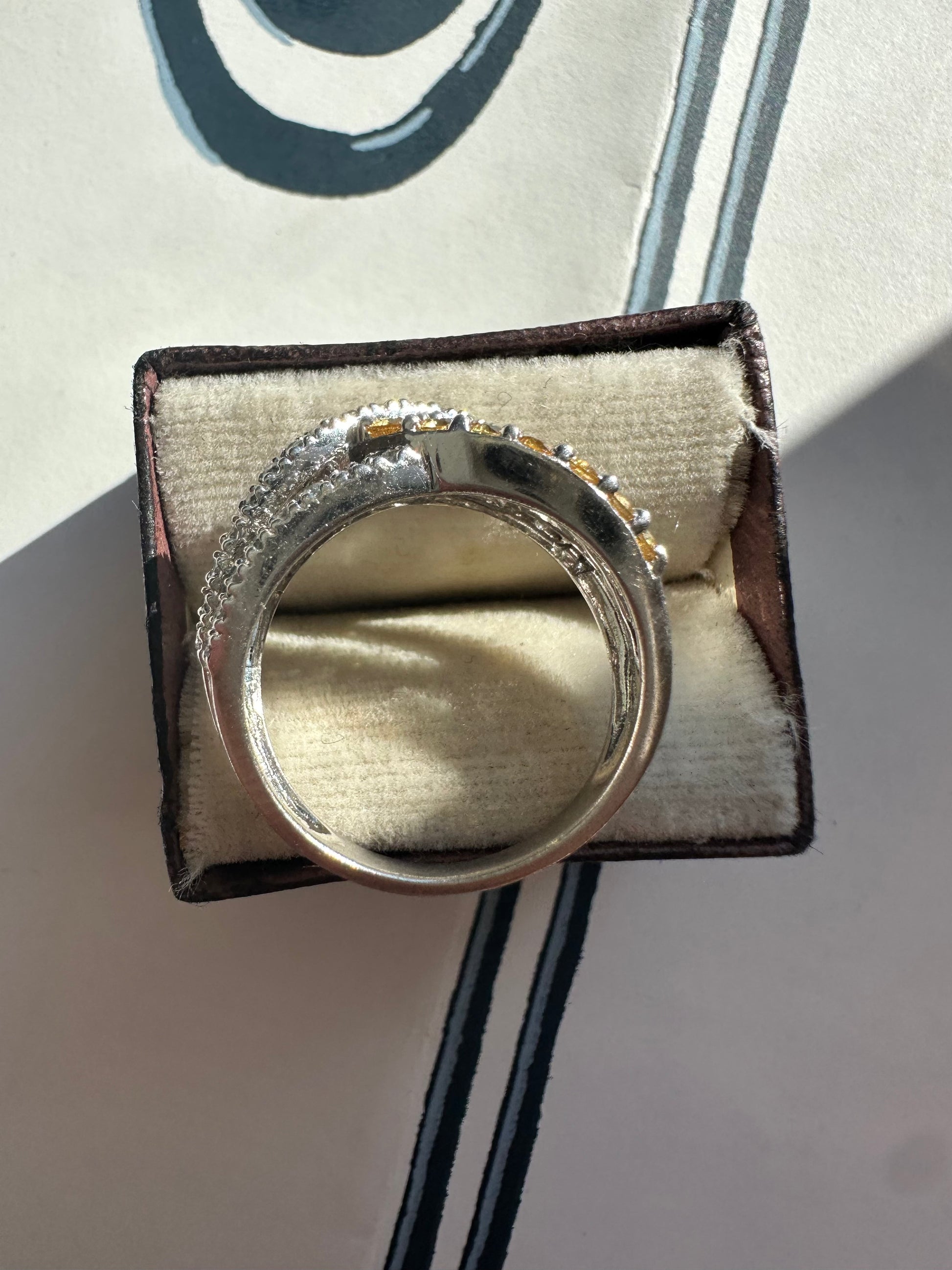 yellow sapphire and diamond crossover ring