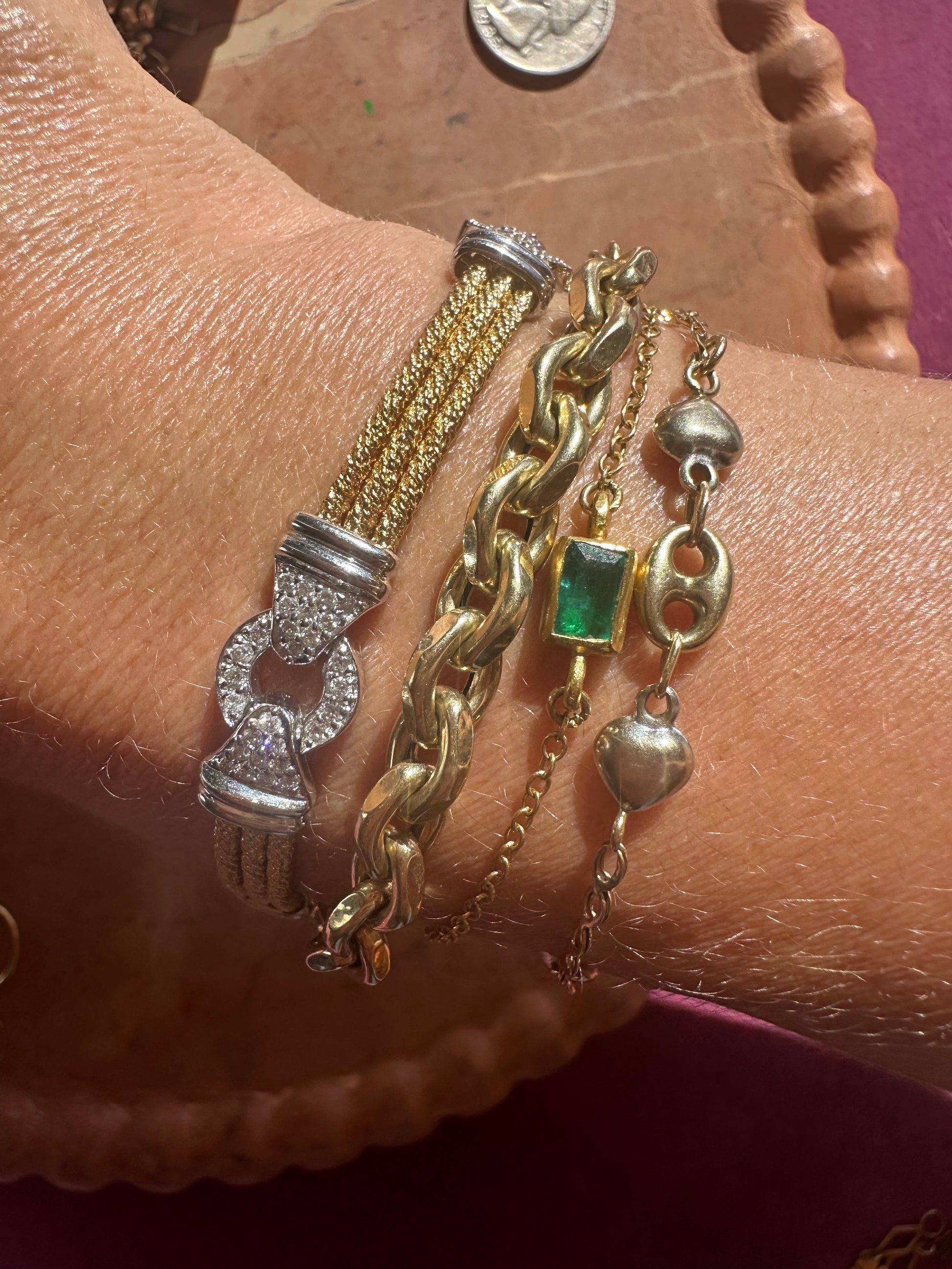 High karat gold and emerald bracelet