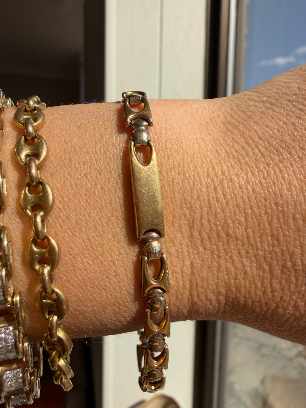 two tone buckle link bracelet with small ID bar